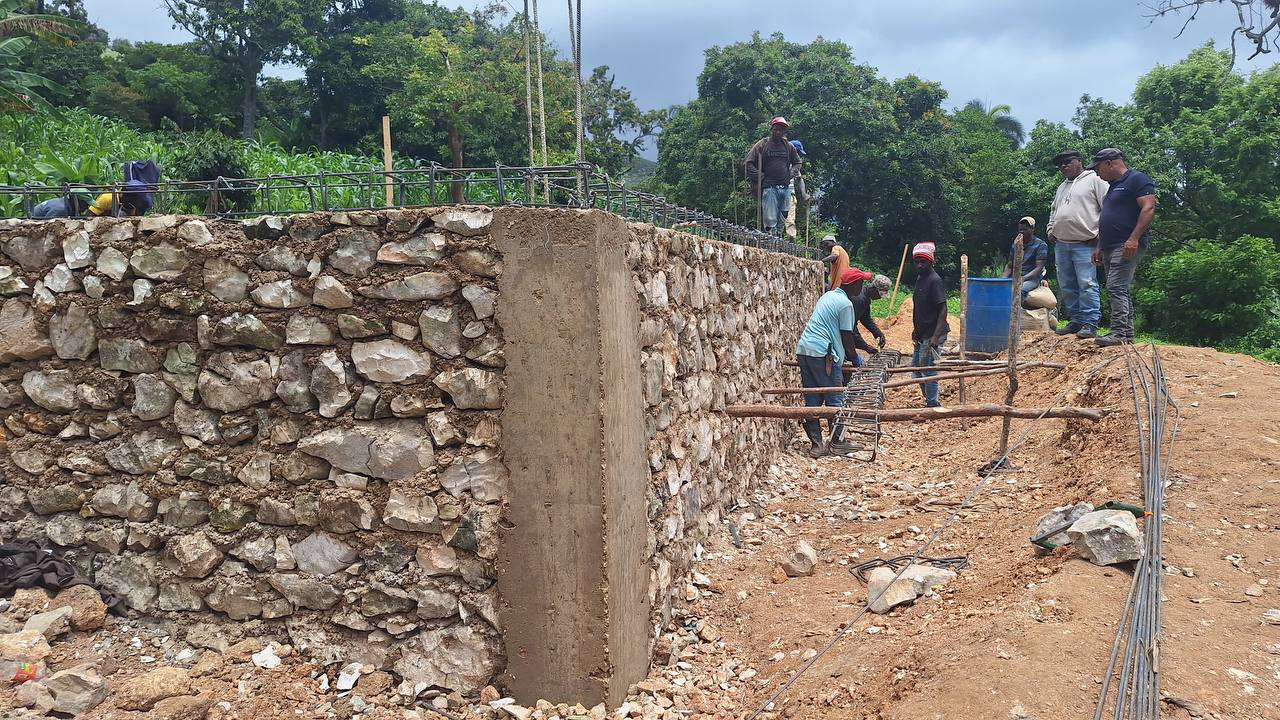 Excavating the Hillside Basin by Hand