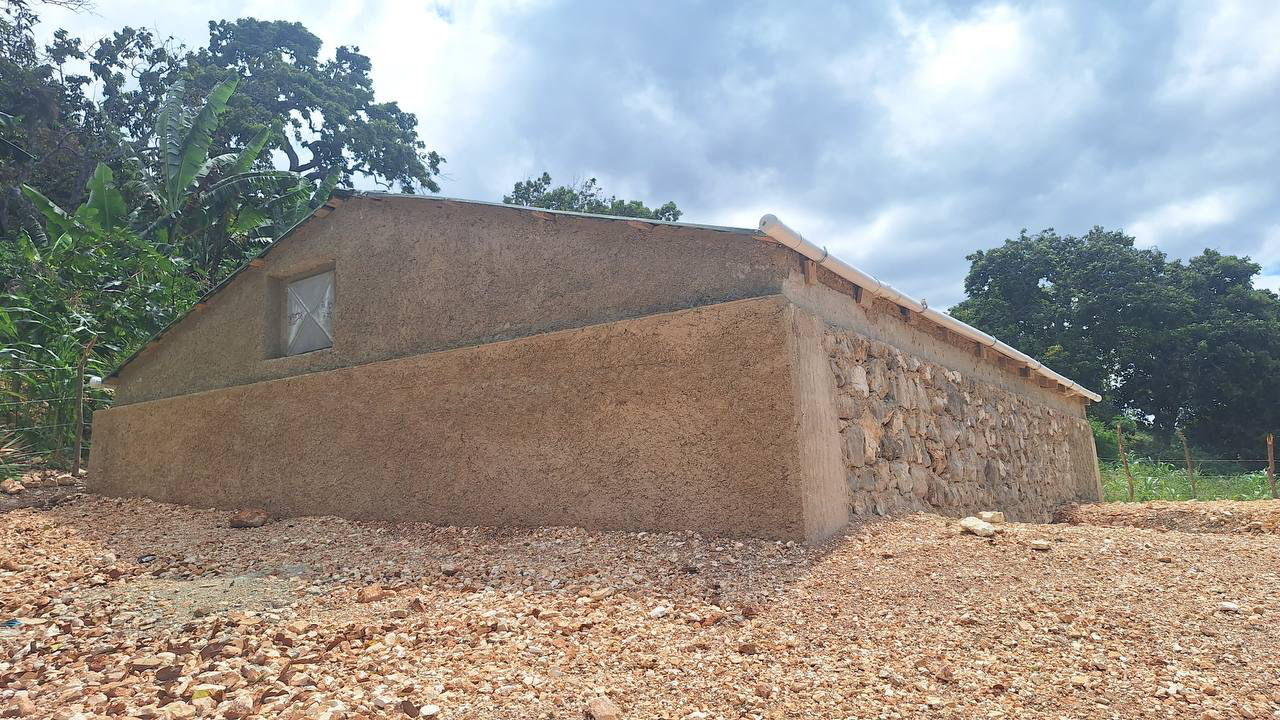 Boucan Ferdinand villagers building the stone and rebar rainwater reservoir by hand in 2026